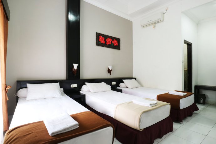 Imagen de la habitación del Hotel Warapsari Inn. Foto 11