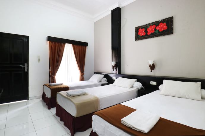 Imagen de la habitación del Hotel Warapsari Inn. Foto 17