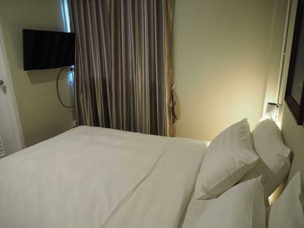 Imagen de la habitación del Hotel Warila Hotel. Foto 8