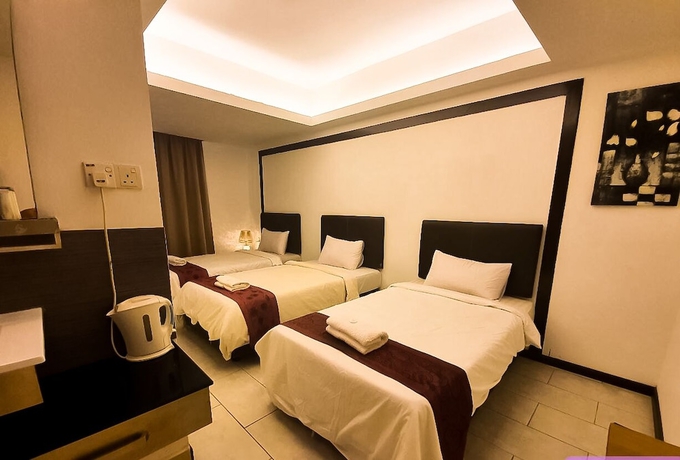 Imagen de la habitación del Hotel Warisan. Foto 4