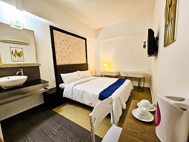 Imagen de la habitación del Hotel Warisan. Foto 6