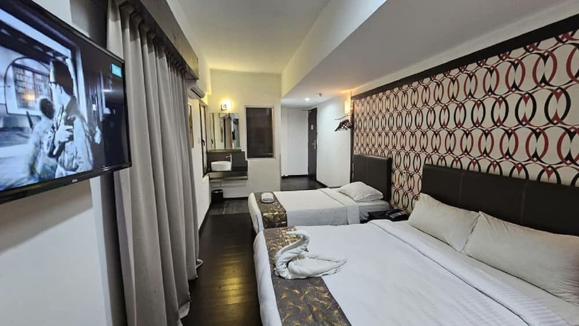 Imagen de la habitación del Hotel Warisan. Foto 9