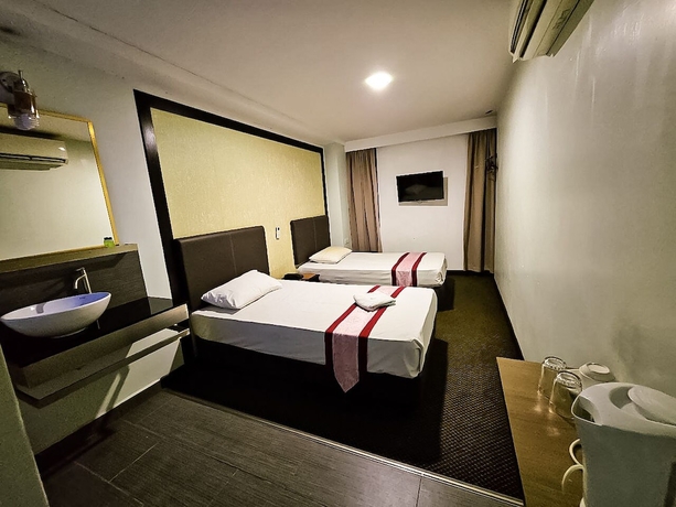 Imagen de la habitación del Hotel Warisan. Foto 10