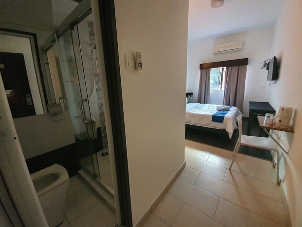 Imagen de la habitación del Hotel Warisan. Foto 13