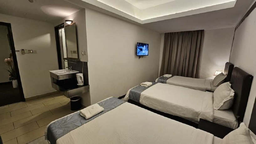 Imagen de la habitación del Hotel Warisan. Foto 14