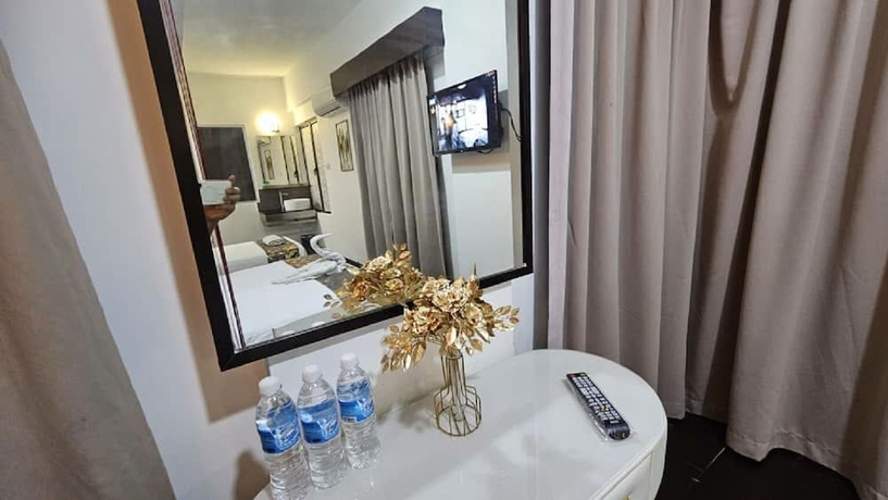 Imagen de la habitación del Hotel Warisan. Foto 15
