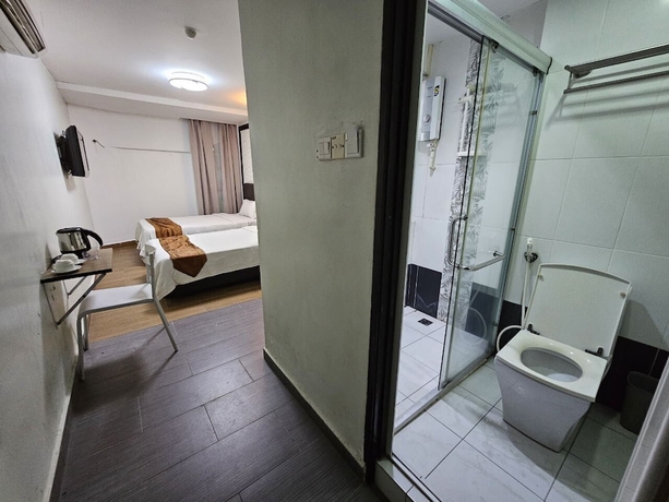 Imagen de la habitación del Hotel Warisan. Foto 16