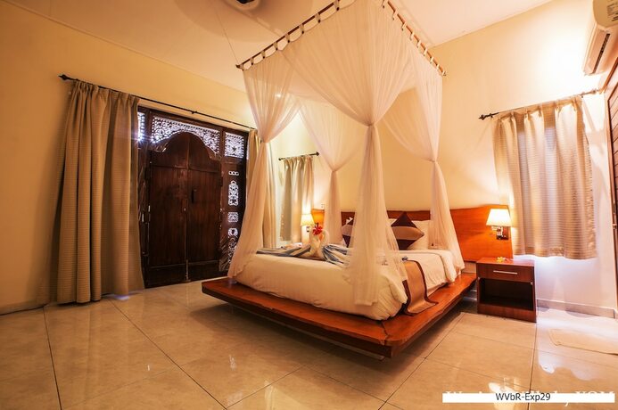 Imagen de la habitación del Hotel Warisan Villa By Reccoma. Foto 16