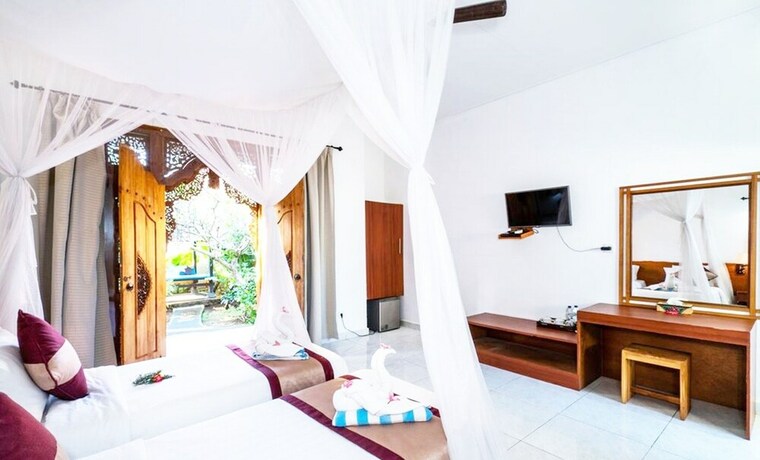 Imagen de la habitación del Hotel Warisan Villa By Reccoma. Foto 21