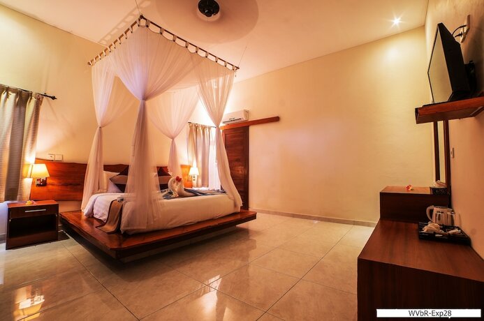 Imagen de la habitación del Hotel Warisan Villa By Reccoma. Foto 28