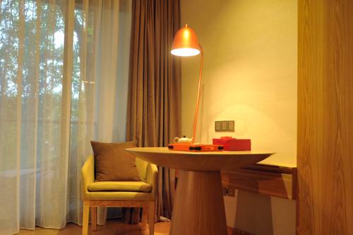 Imagen de la habitación del Hotel Warm Island Resort. Foto 3