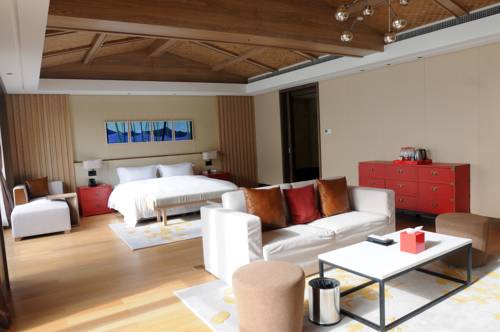 Imagen de la habitación del Hotel Warm Island Resort. Foto 6