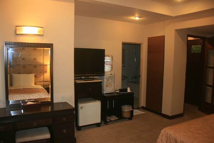 Imagen de la habitación del Hotel Warm Life. Foto 8