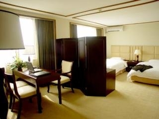 Imagen de la habitación del Hotel Warm Yes Business. Foto 3