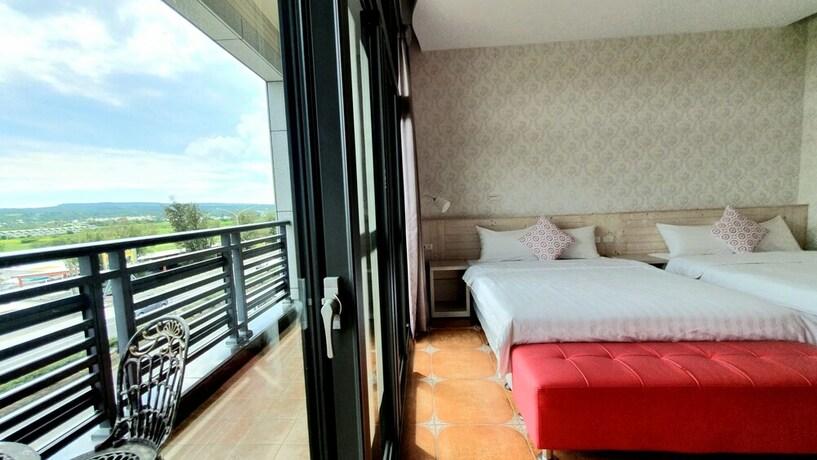 Imagen de la habitación del Hotel Warm and Cozy Inn. Foto 24