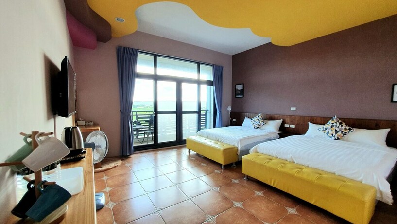 Imagen de la habitación del Hotel Warm and Cozy Inn. Foto 27