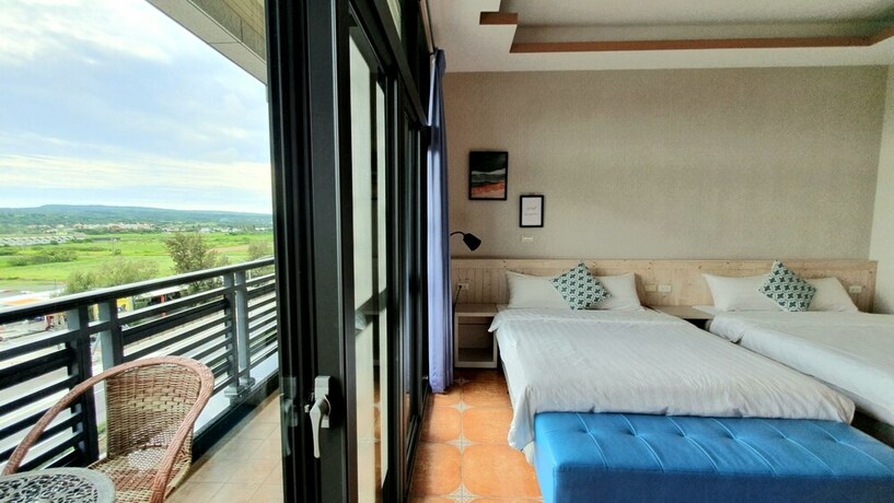 Imagen de la habitación del Hotel Warm and Cozy Inn. Foto 28