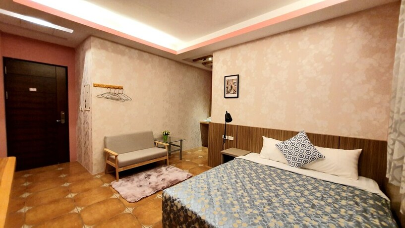 Imagen de la habitación del Hotel Warm and Cozy Inn. Foto 29