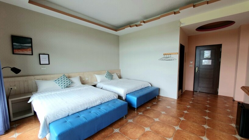 Imagen de la habitación del Hotel Warm and Cozy Inn. Foto 30