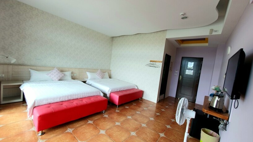 Imagen de la habitación del Hotel Warm and Cozy Inn. Foto 32