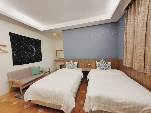 Imagen de la habitación del Hotel Warm and Cozy Inn. Foto 37