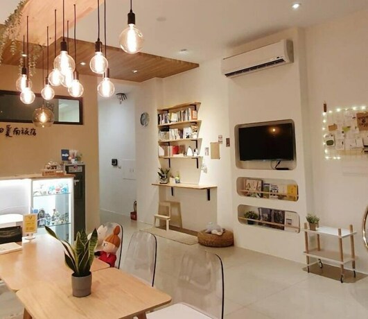 Imagen de los interiores del Hotel Warm and Cozy Inn. Foto 40