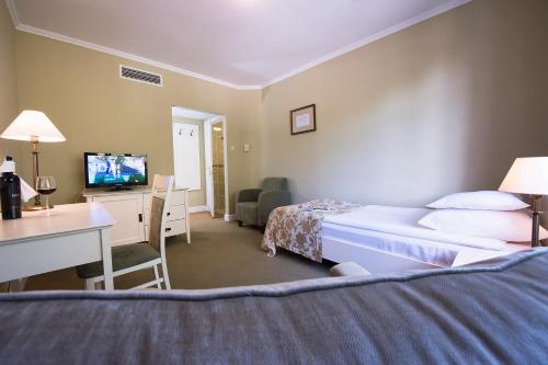 Imagen de la habitación del Hotel Warmia Park. Foto 5