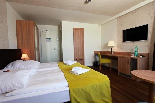 Imagen de la habitación del Hotel Warnow. Foto 10
