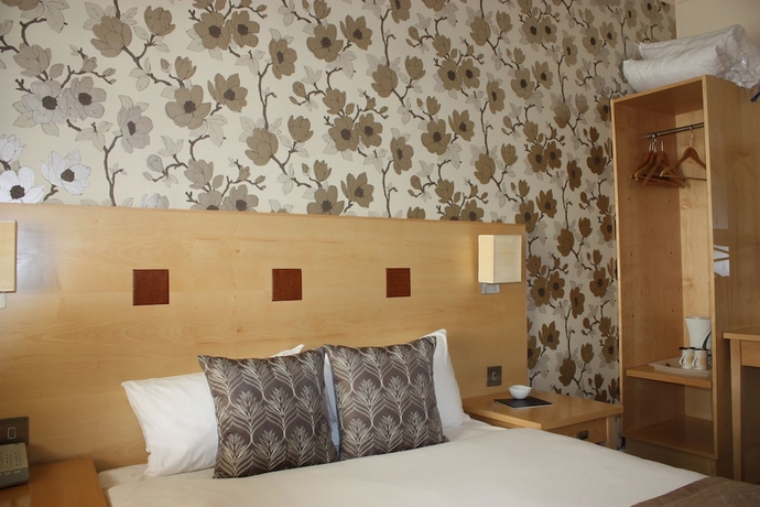 Imagen de la habitación del Hotel Warwick Arms. Foto 12