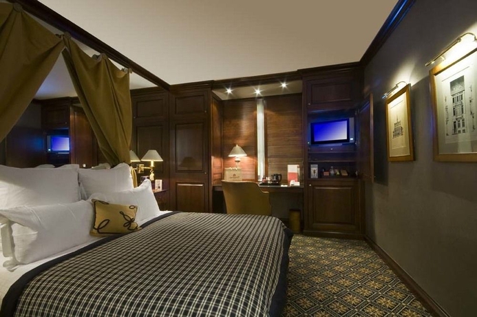 Imagen de la habitación del Hotel Warwick Brussels. Foto 8