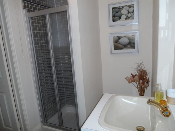 Imagen de la habitación del Hotel Warwick Lodge Guesthouse. Foto 6