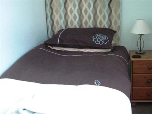 Imagen de la habitación del Hotel Warwick Lodge Guesthouse. Foto 7