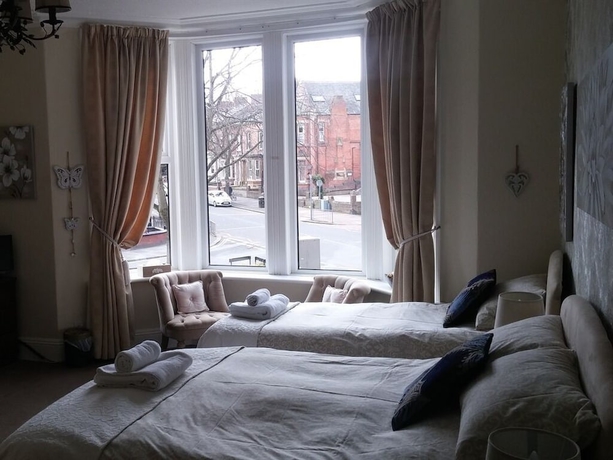 Imagen de la habitación del Hotel Warwick Lodge Guesthouse. Foto 15