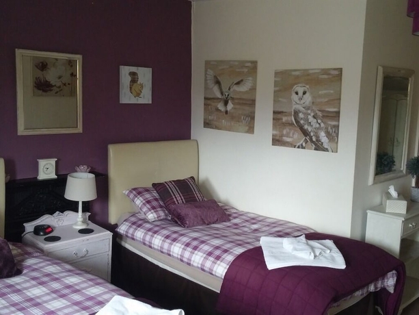 Imagen de la habitación del Hotel Warwick Lodge Guesthouse. Foto 17