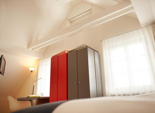 Imagen de la habitación del Hotel Wassberg Zurich. Foto 19