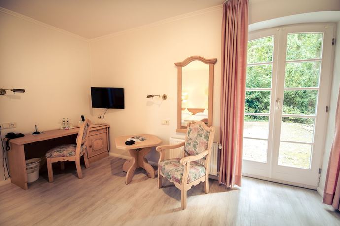 Imagen de la habitación del Hotel Wassermuehle Heiligenthal. Foto 10