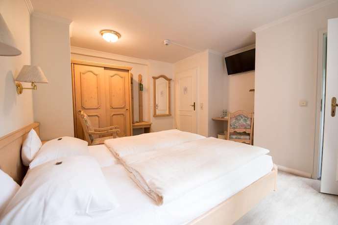 Imagen de la habitación del Hotel Wassermuehle Heiligenthal. Foto 11