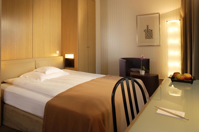 Imagen de la habitación del Hotel Wasserturm Cologne, Curio Collection By Hilton. Foto 7