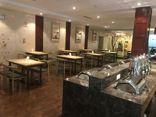 Imagen del bar/restaurante del Hotel Wassim Jiaxing. Foto 9