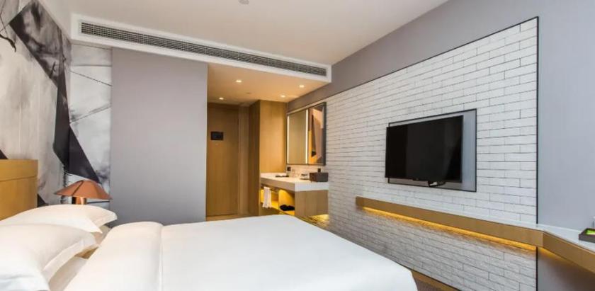 Imagen de la habitación del Hotel Wassim R Hotel (Suzhou Shantang Street Shilu Metro Station). Foto 4