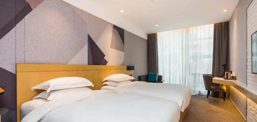 Imagen de la habitación del Hotel Wassim R Hotel (Suzhou Shantang Street Shilu Metro Station). Foto 7
