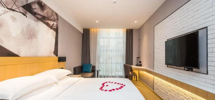 Imagen de la habitación del Hotel Wassim R Hotel (Suzhou Shantang Street Shilu Metro Station). Foto 10