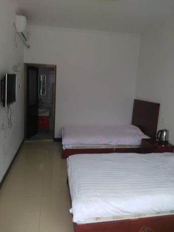 Imagen de la habitación del Hotel Water Great Wall Heshi Mountain House. Foto 16