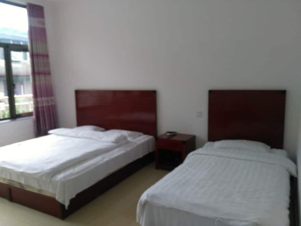Imagen de la habitación del Hotel Water Great Wall Heshi Mountain House. Foto 17