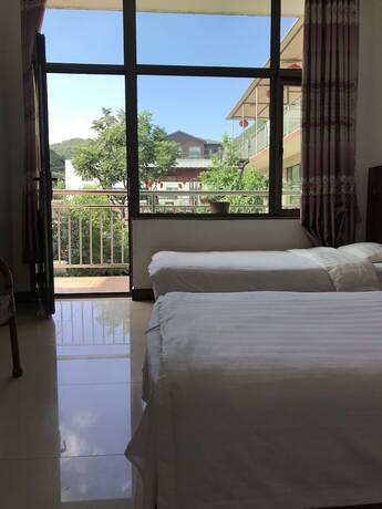 Imagen de la habitación del Hotel Water Great Wall Heshi Mountain House. Foto 20