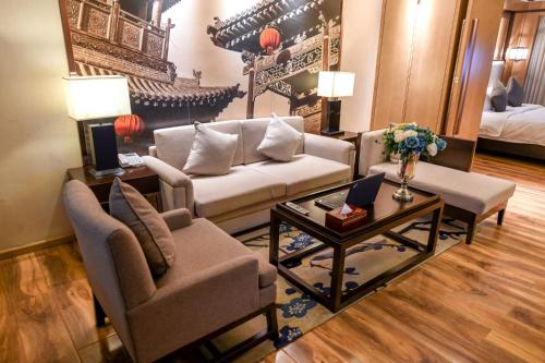 Imagen de la habitación del Hotel Water, Pingyao. Foto 6