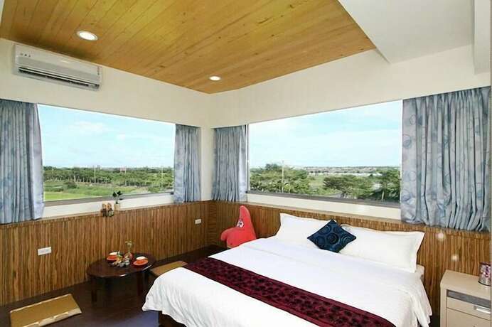 Imagen de la habitación del Hotel Waterbirds Family. Foto 14