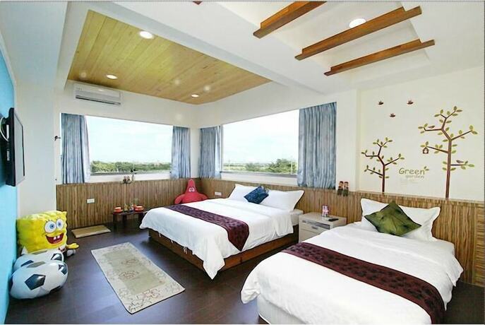 Imagen de la habitación del Hotel Waterbirds Family. Foto 19