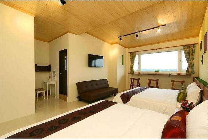 Imagen de la habitación del Hotel Waterbirds Family. Foto 21