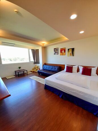 Imagen de la habitación del Hotel Waterbirds Family. Foto 22